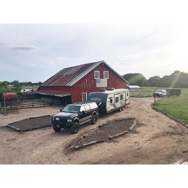 farm truck in front of a barn